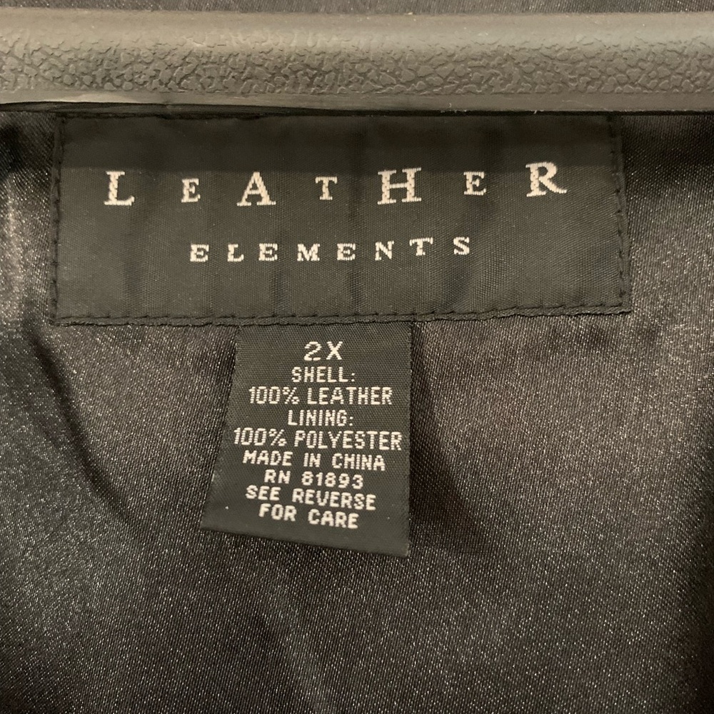 Unisex black leather jacket button down